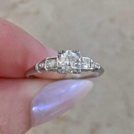 arles engagement ring with channel-set single cut diamonds on the shoulders