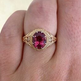 Vernier Ring features a 2.04 carat oval-cut pink tourmaline center