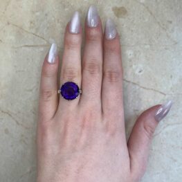 Round Amethyst French Platinum Ring Zoomed Out Hand Photo