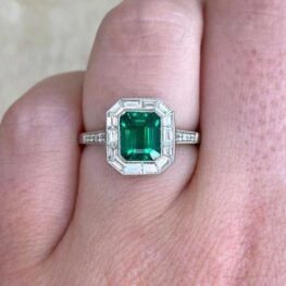 Tavera Ring featuring an emerald-cut Zambian emerald that weighs 1.49 carats