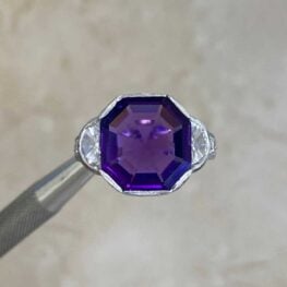 Amethyst and Diamond ring with four additional pave-set round brilliant cut diamonds on the shoulders