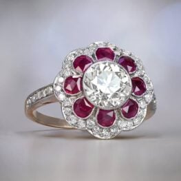 Diamond and Ruby Cluster Halo Engagement Ring Artistic